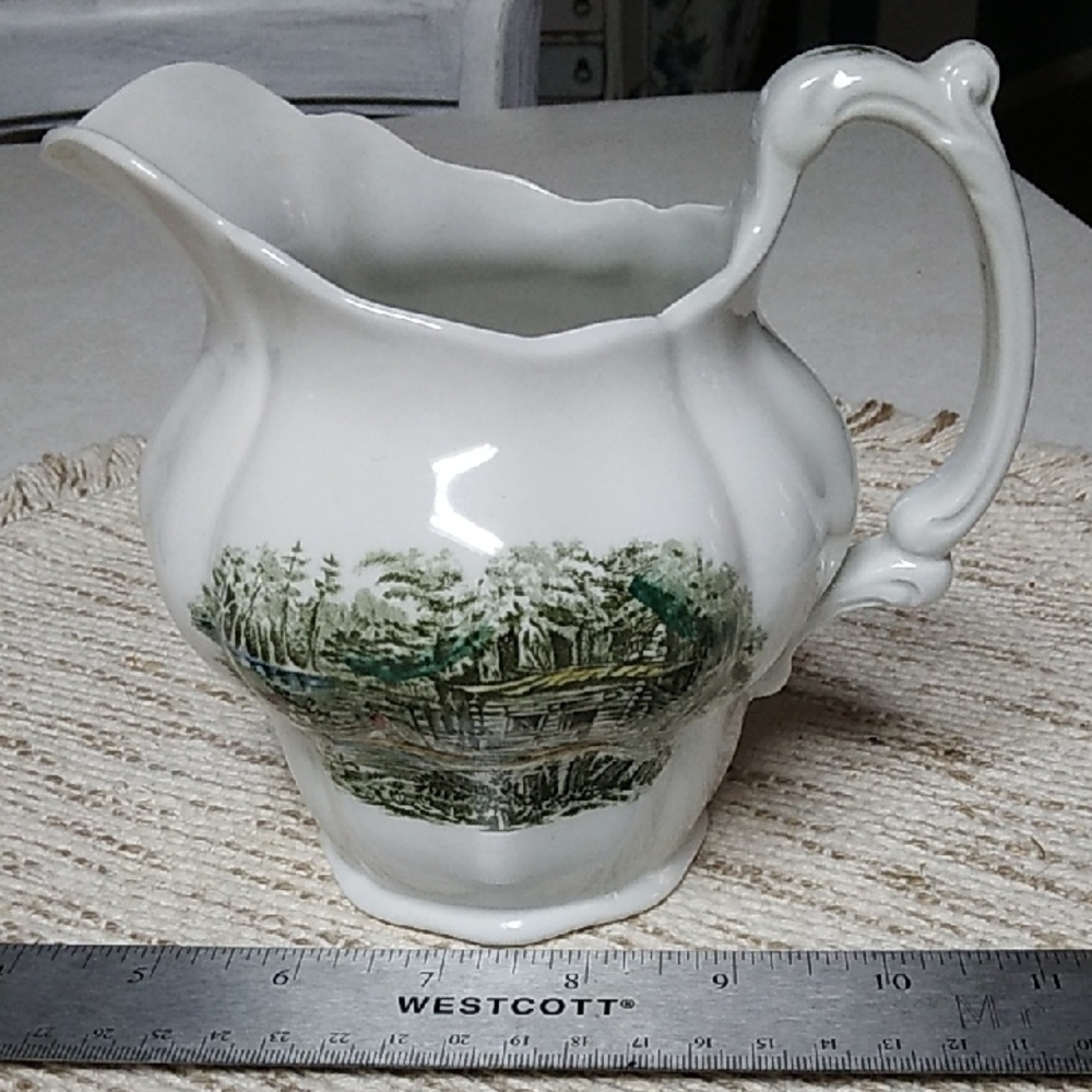 Elegant Green and White Ceramic Pitcher with Pastoral Art
